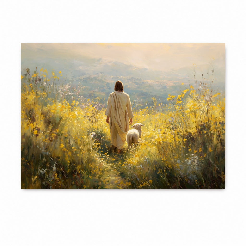 A rectangular art print or canvas showing Jesus in a cream robe walking through a sunlit yellow wildflower field with a white sheep